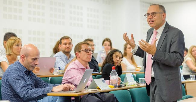 Dr.   Stefan Schmid is speaking to ESCP Students, Berlin campus